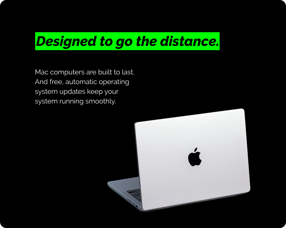 Mac laptop with text 'Designed to go the distance.' on a black background